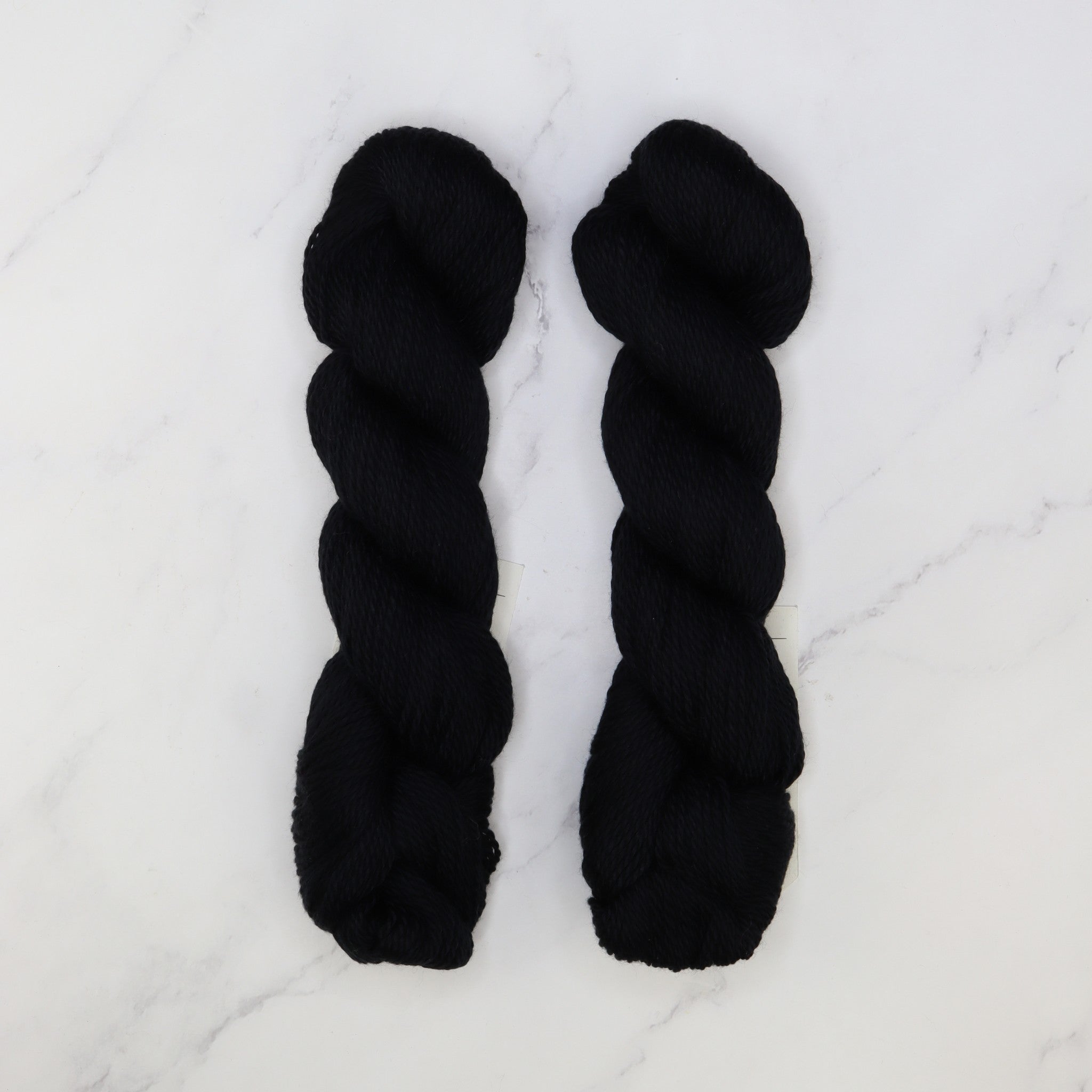 Amano Sami in colourway Coconut Charcoal – 8ply weight cotton yarn