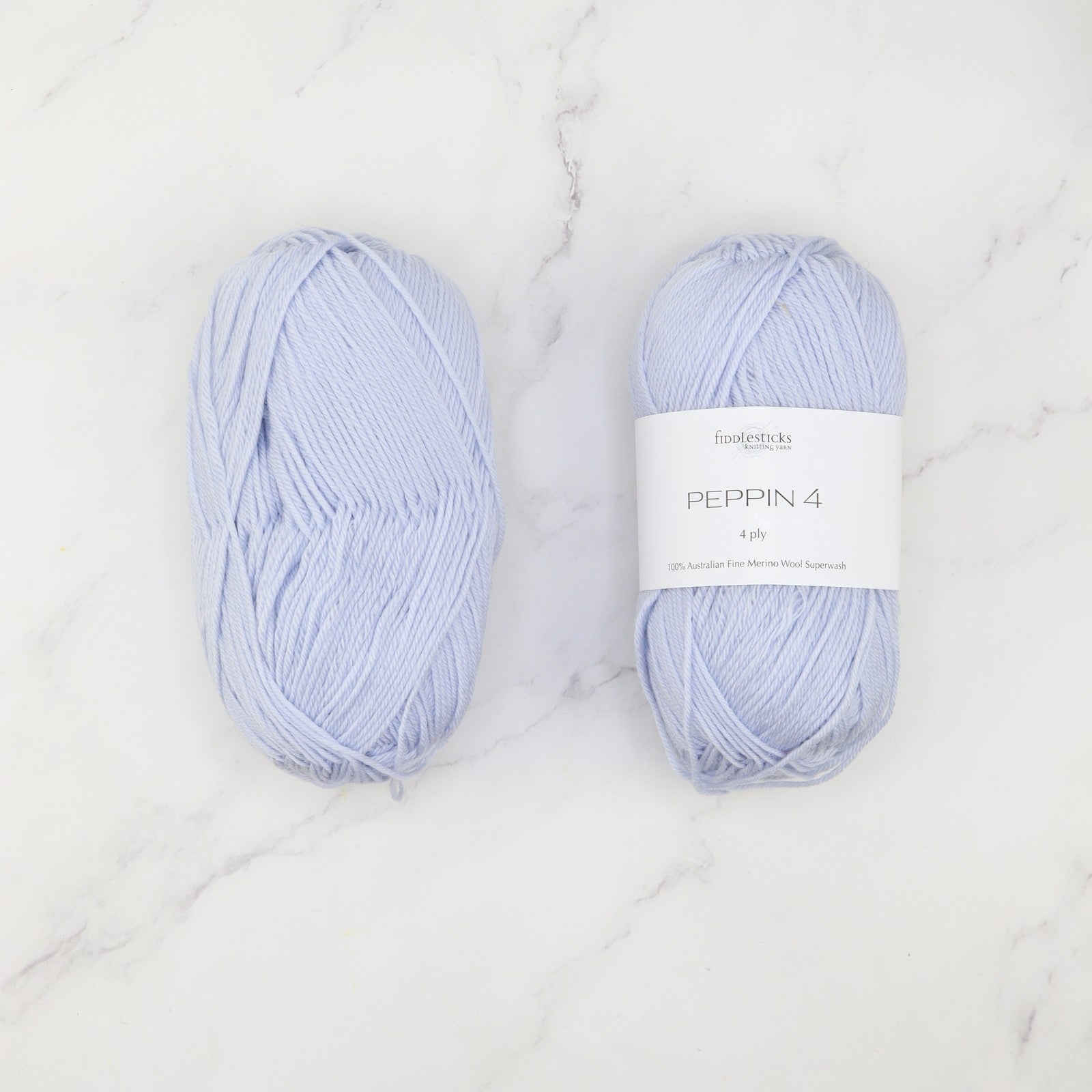 Fiddlesticks Peppin 4 in colourway Ice Blue – 4ply weight merino yarn