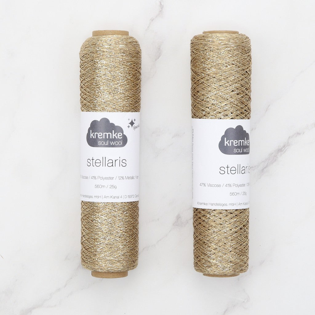 Kremke Soul Wool Stellaris in colourway Pale Gold – 2ply weight viscose, polyester, metallic fibre yarn