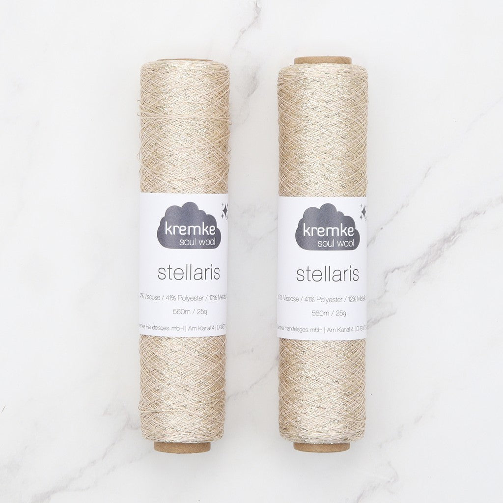 Kremke Soul Wool Stellaris in colourway Cream Gold – 2ply weight viscose, polyester, metallic fibre yarn
