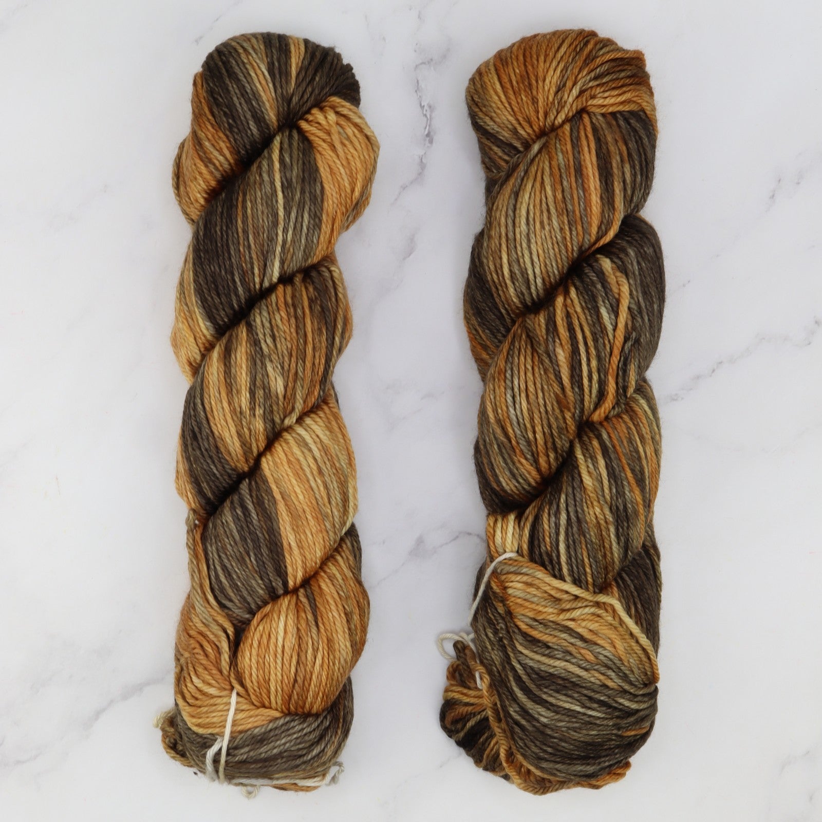 Fiori DK IV in colourway Antiquity Bronze – 8ply weight merino yarn