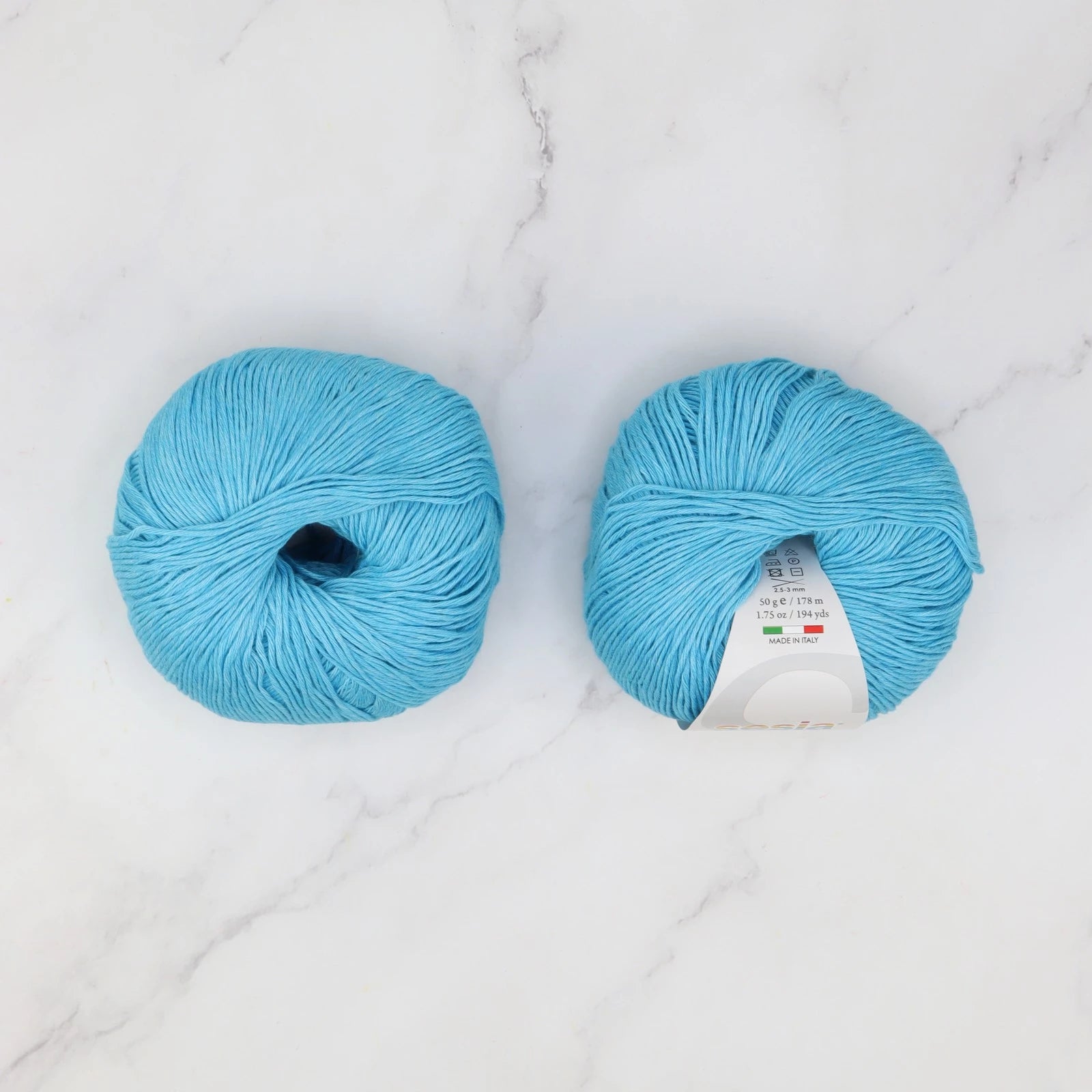 Sesia Jeans in colourway Bright Sky Blue – 4ply weight cotton yarn