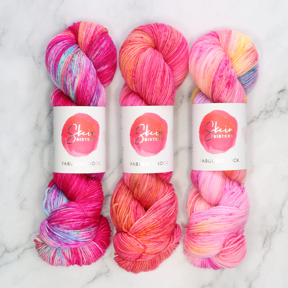 Knit for the Girls 3 skein set – three skeins of Skein Sisters Fabulous Sock in pink colourways