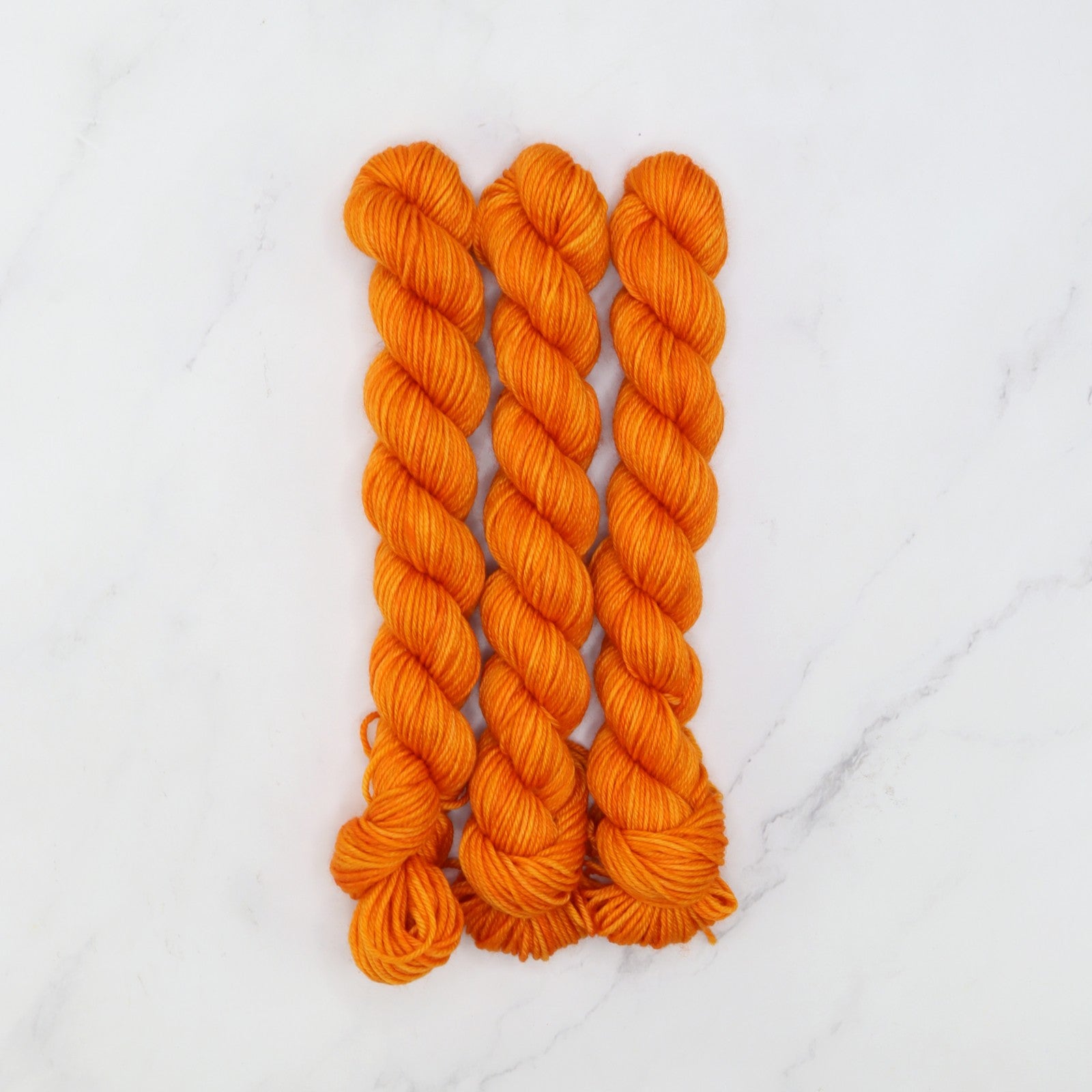 Skein Sisters Fabulous Sock Minis 20g/80m in colourway Cumquat – 4ply weight merino, nylon yarn