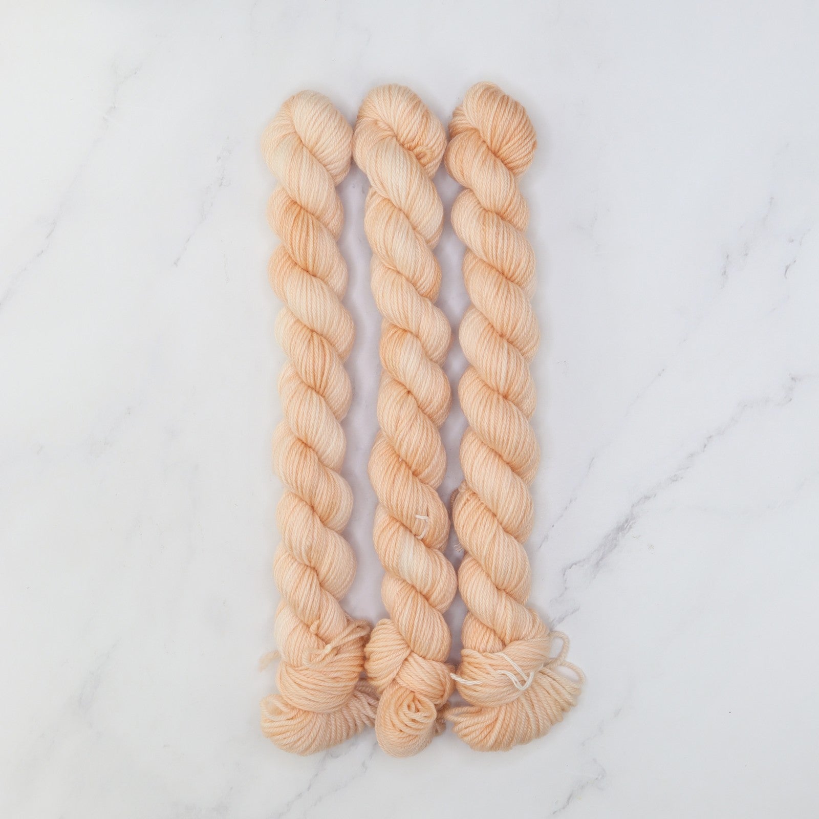 Skein Sisters Fabulous Sock Minis 20g/80m in colourway DePeach Mode – 4ply weight merino, nylon yarn