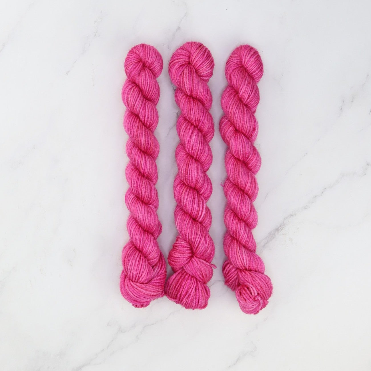 Skein Sisters Fabulous Sock Minis 20g/80m in colourway Fuchsia Proof – 4ply weight merino, nylon yarn