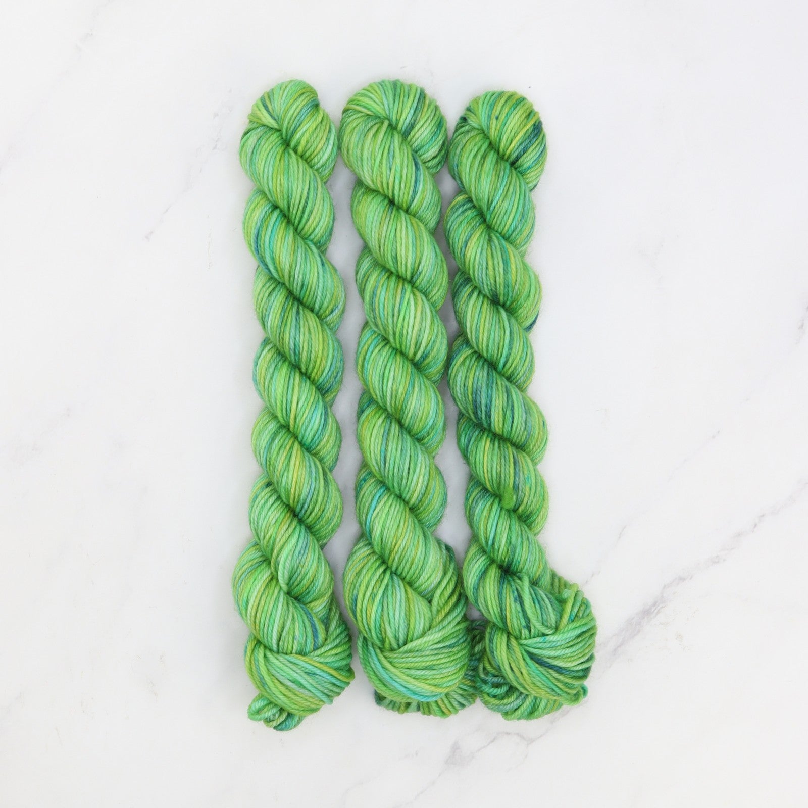 Skein Sisters Fabulous Sock Minis 20g/80m in colourway Green Looper – 4ply weight merino, nylon yarn
