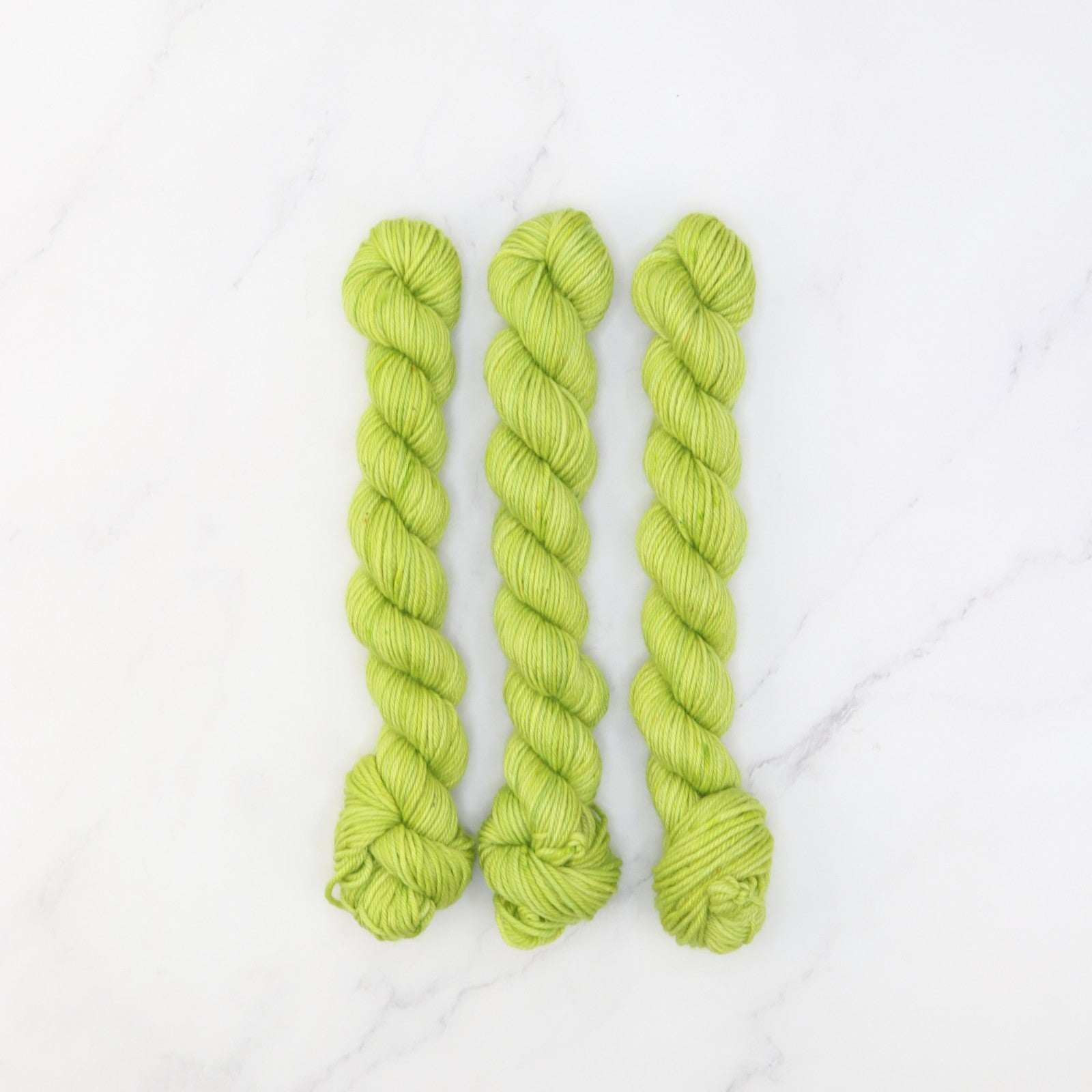 Skein Sisters Fabulous Sock Minis 20g/80m in colourway Limelight – 4ply weight merino, nylon yarn