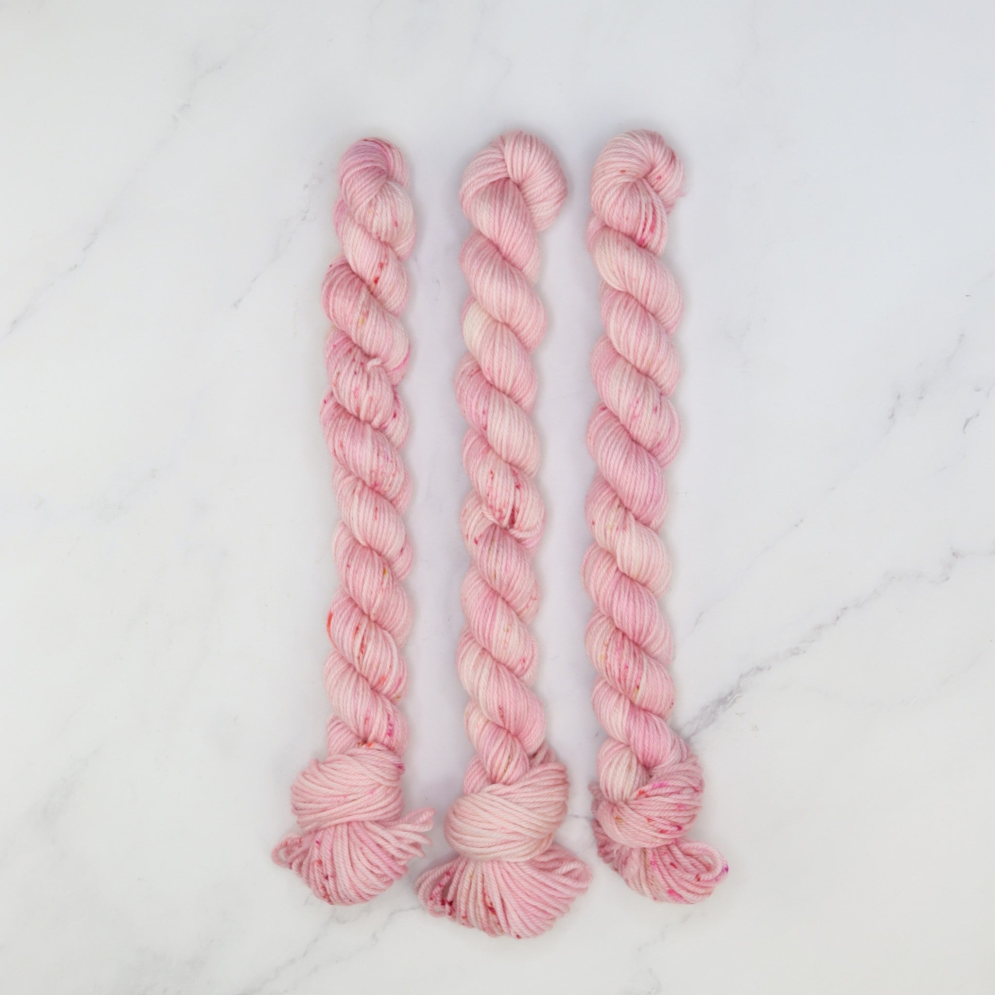 Skein Sisters Fabulous Sock Minis 20g/80m in colourway Raspberry Cream – 4ply weight merino, nylon yarn
