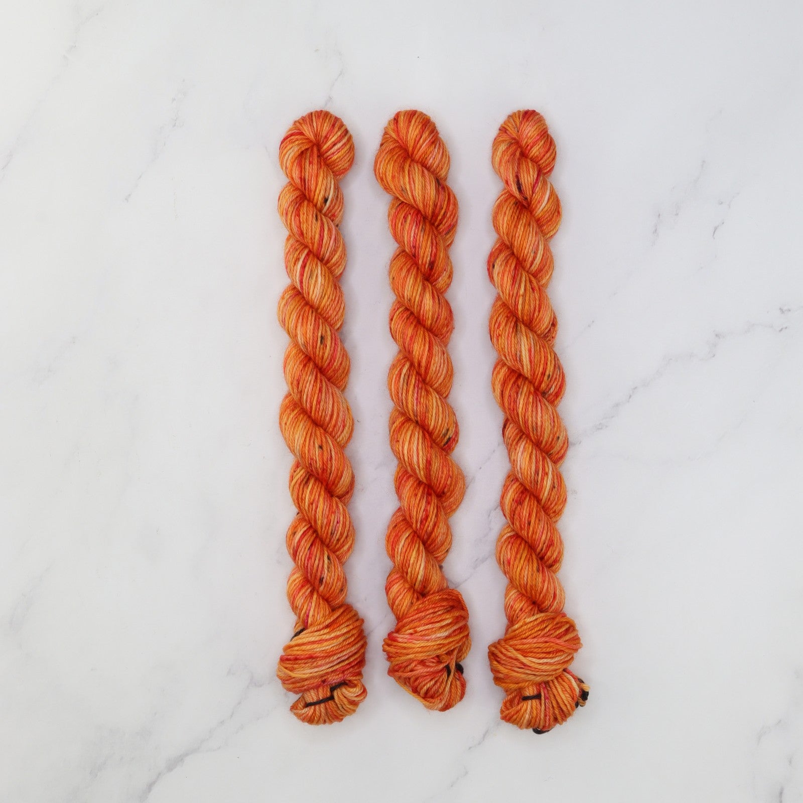 Skein Sisters Fabulous Sock Minis 20g/80m in colourway Scorcher – 4ply weight merino, nylon yarn
