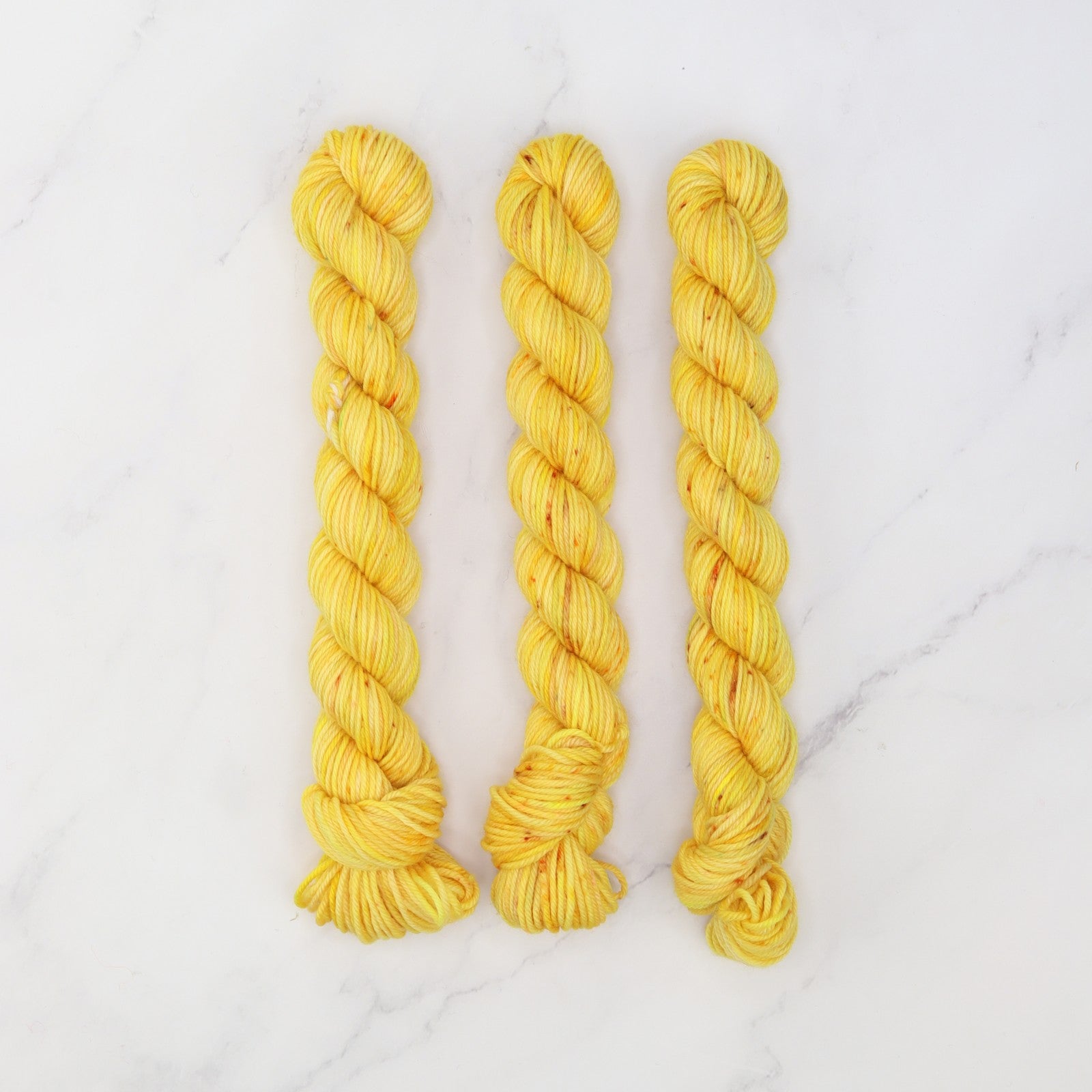 Skein Sisters Fabulous Sock Minis 20g/80m in colourway Yellow Bush Pea – 4ply weight merino, nylon yarn