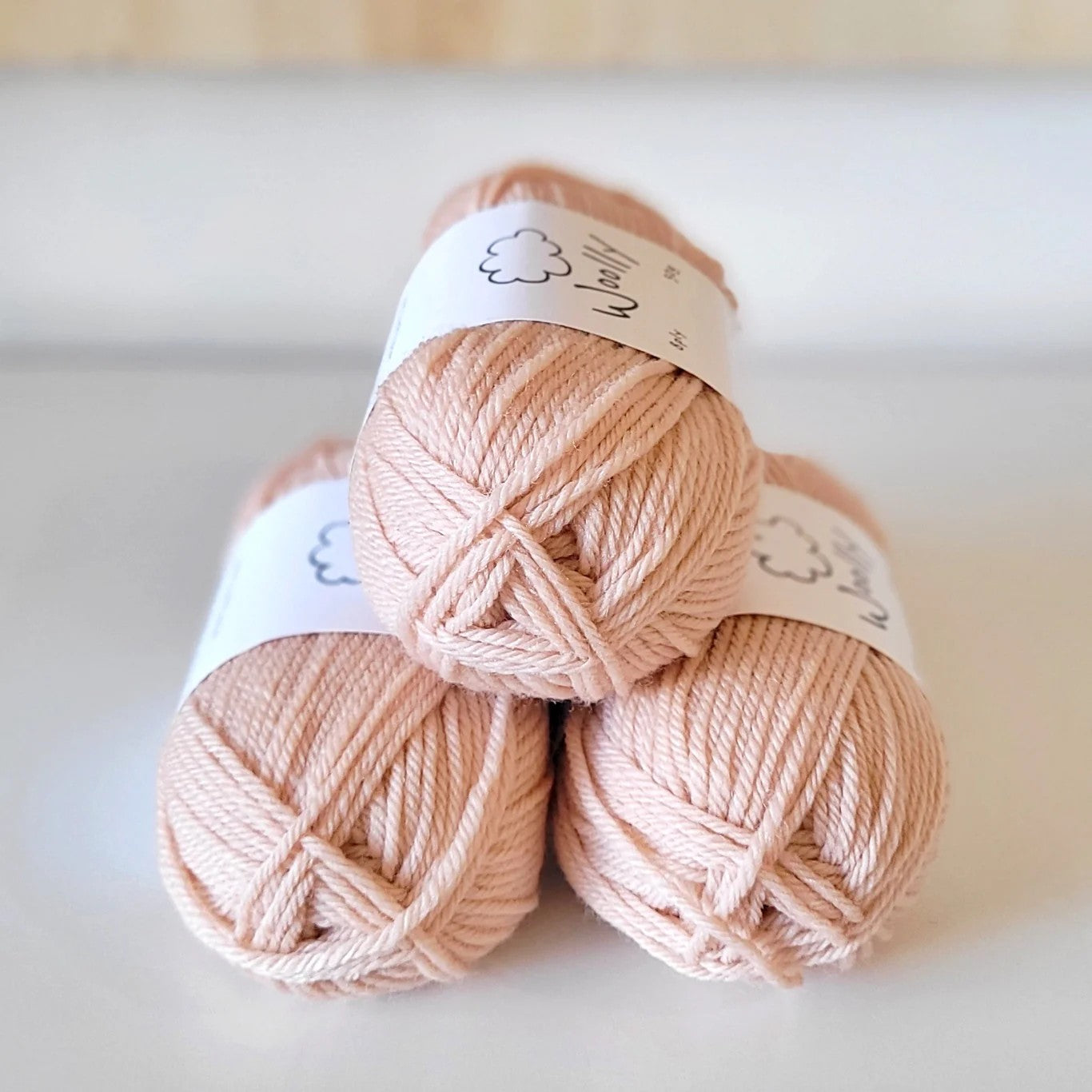 Woolly Yarns Woolly 8ply in colourway Peachy Keen – 8ply weight wool yarn