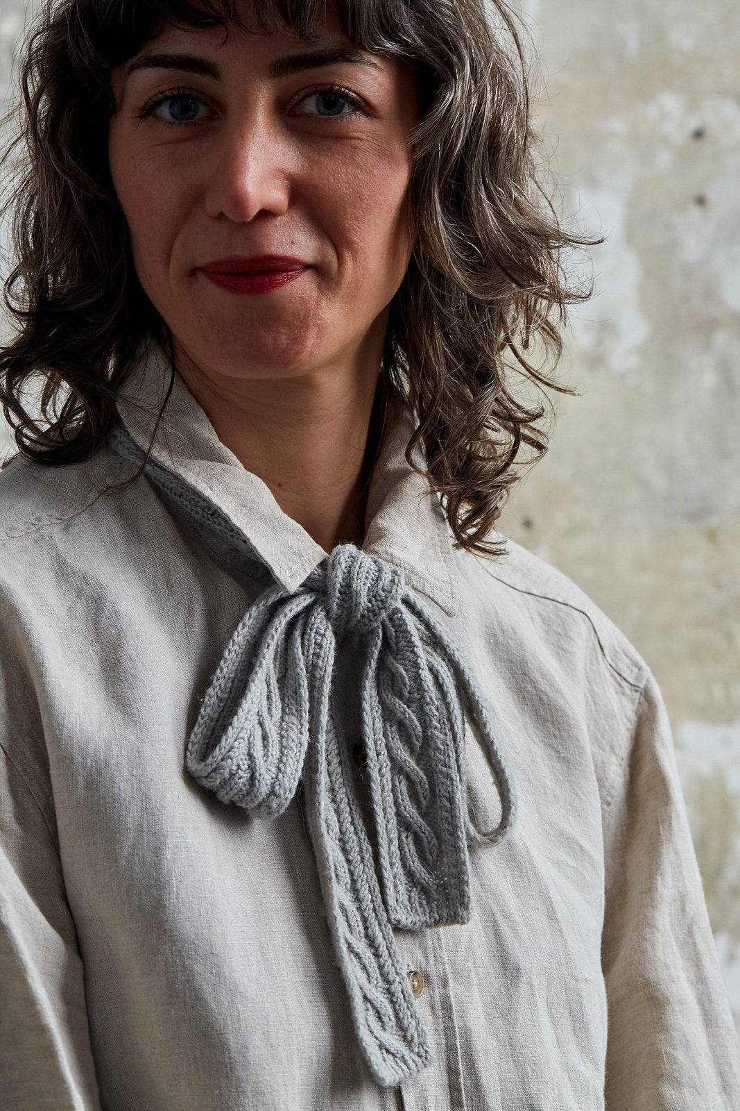 Linka neck tie by Nina Holubcova, knitted in Urth Yarns Trill
