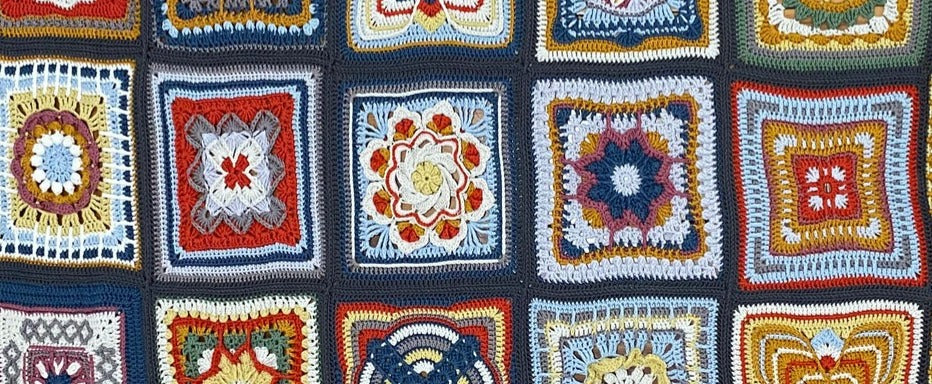 Deb's finished Nuts about Squares blanket, close up on the squares