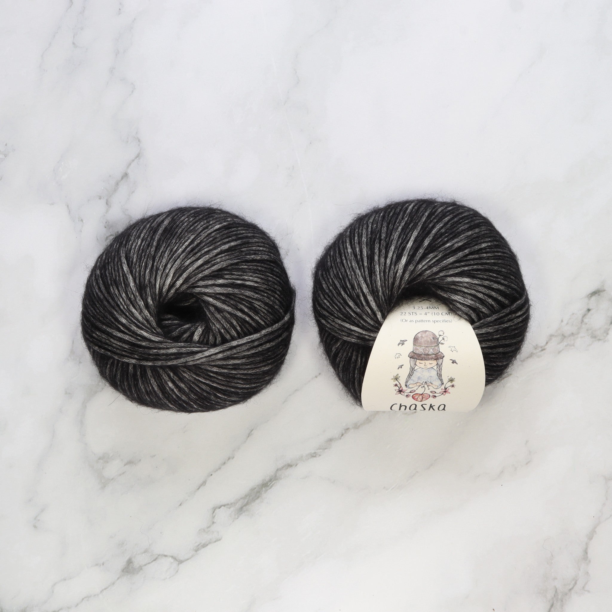 Chaska Wara in colourway Black – 8ply weight cotton, alpaca, merino yarn