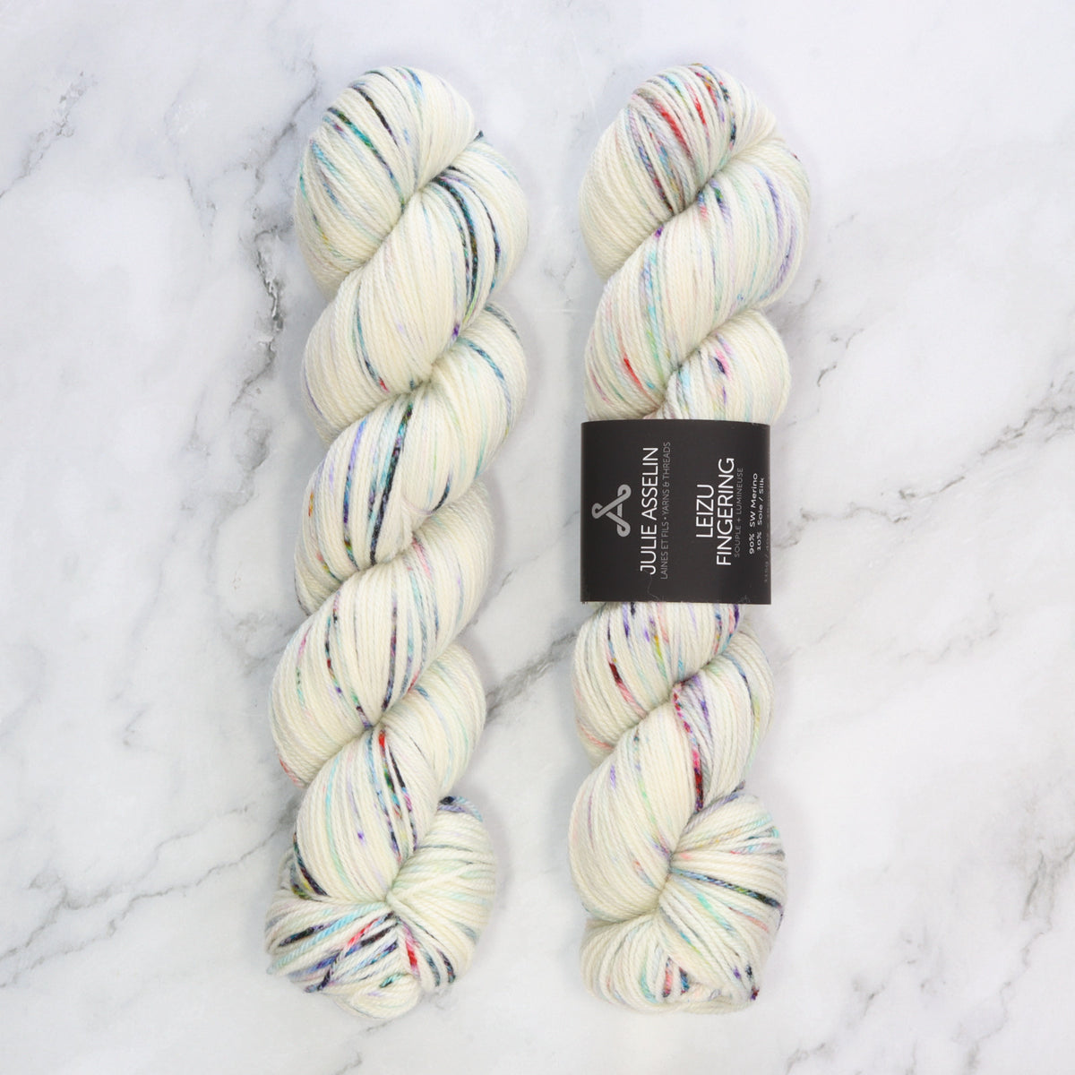 Julie Asselin Leizu Fingering in colourway Kaleidoscope – 4ply weight merino, silk yarn