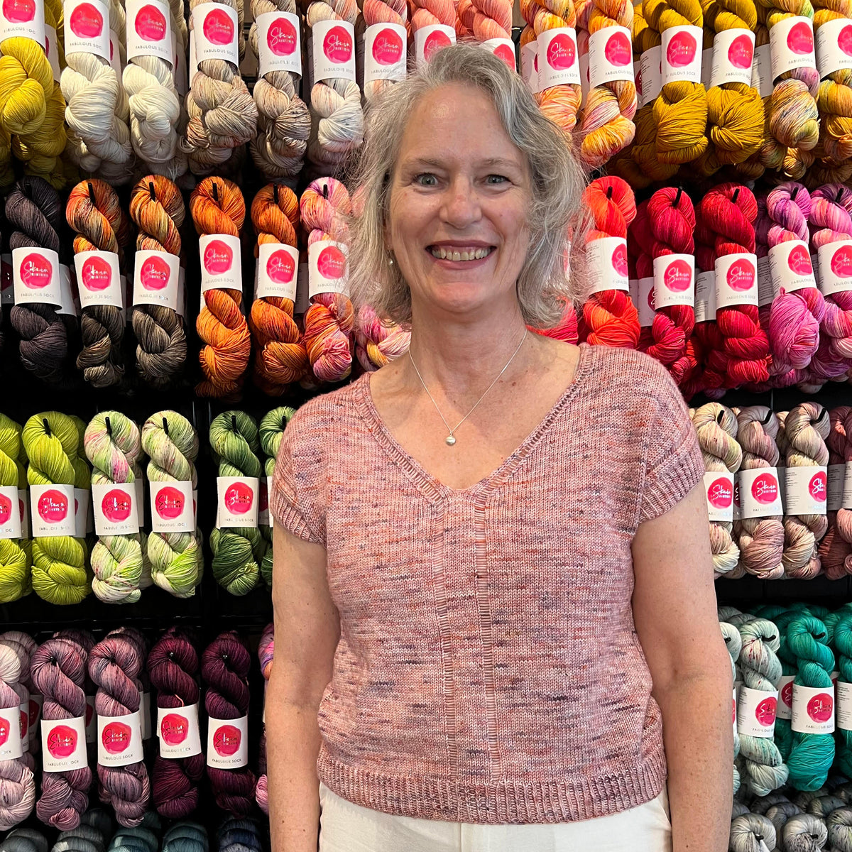 Helen wearing the Outline Tee by Jessie Maed Designs, knitted in hand-dyed Skein Sisters Fabulous Sock