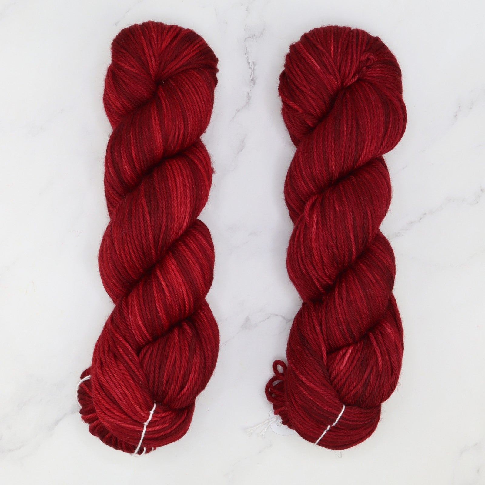 Fiori DK IV in colourway Dark Ruby – 8ply weight merino yarn