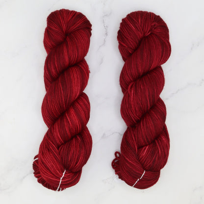 Fiori DK IV in colourway Dark Ruby – 8ply weight merino yarn