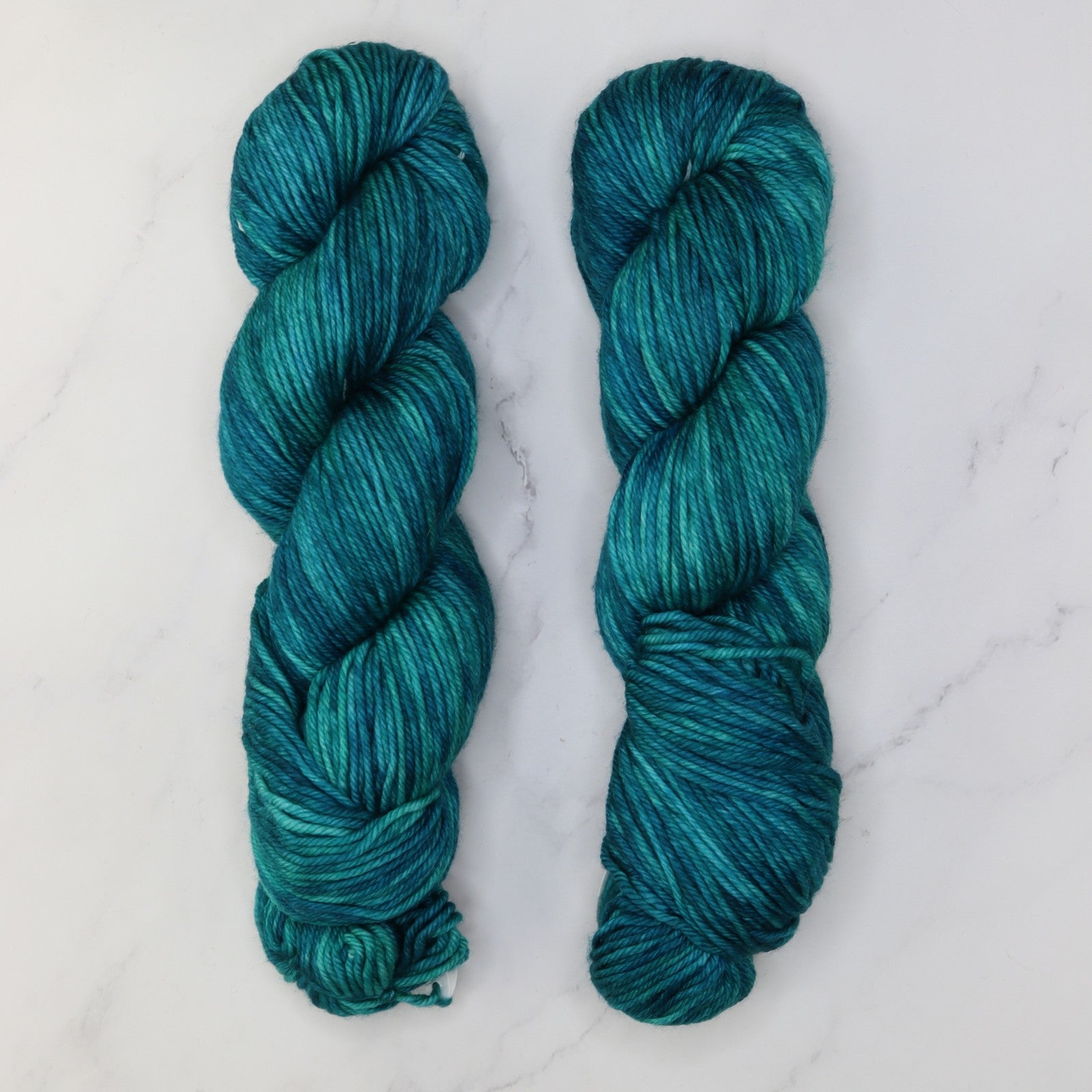 Fiori DK IV in colourway Tempo Teal – 8ply weight merino yarn