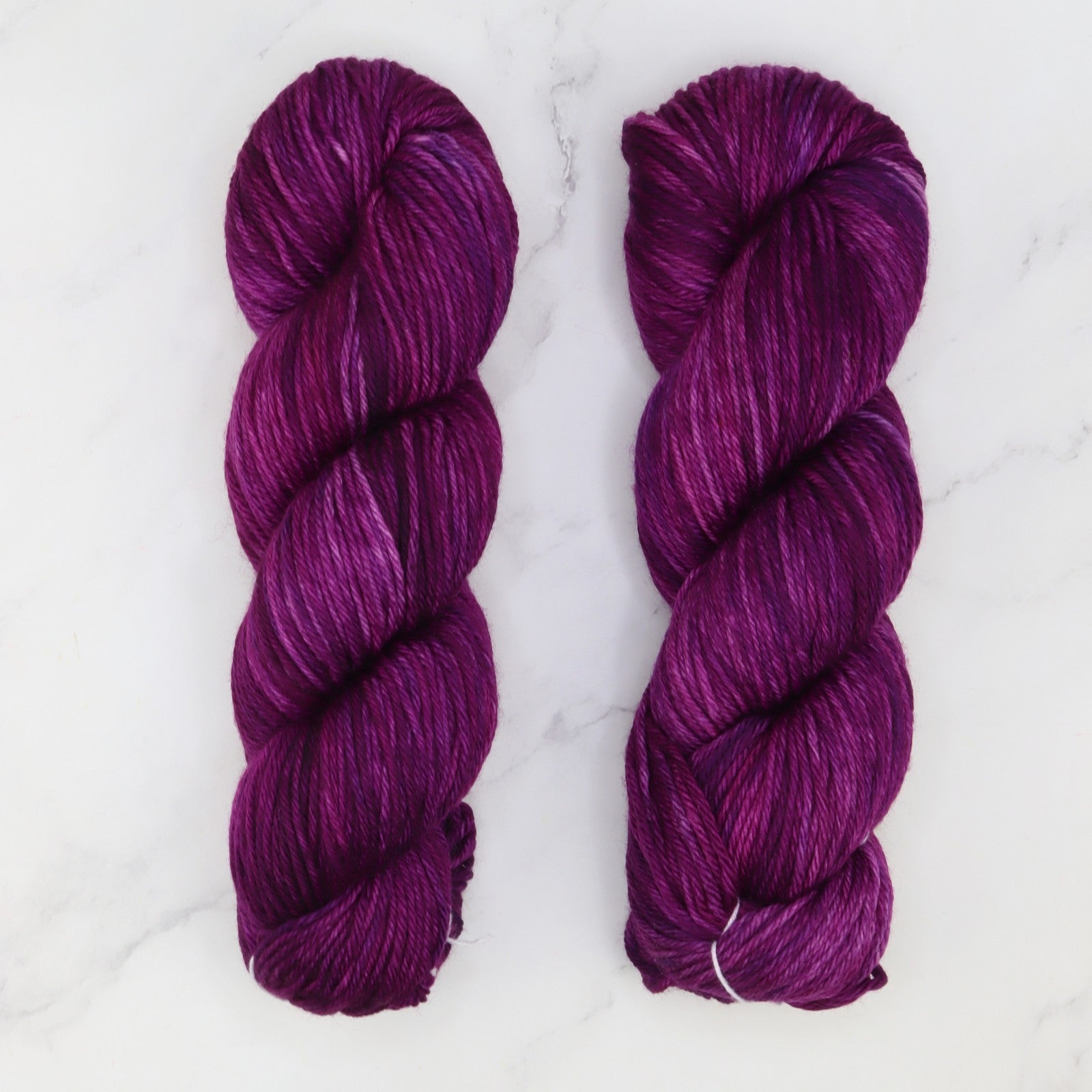 Fiori DK IV in colourway Purple Rising – 8ply weight merino yarn