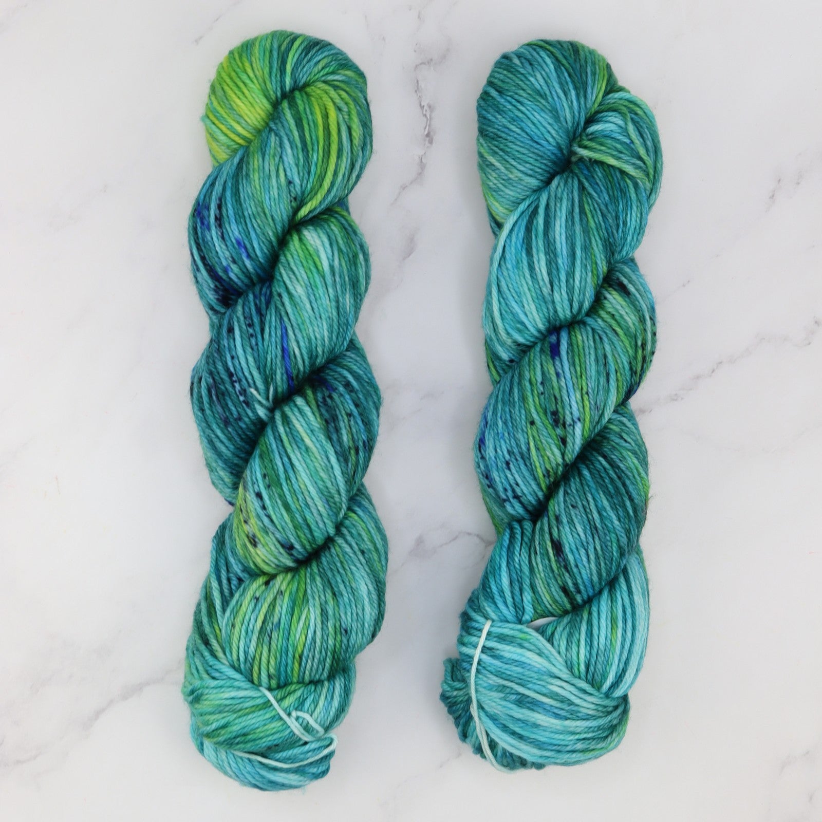 Fiori DK IV in colourway Mermaid Waters – 8ply weight merino yarn