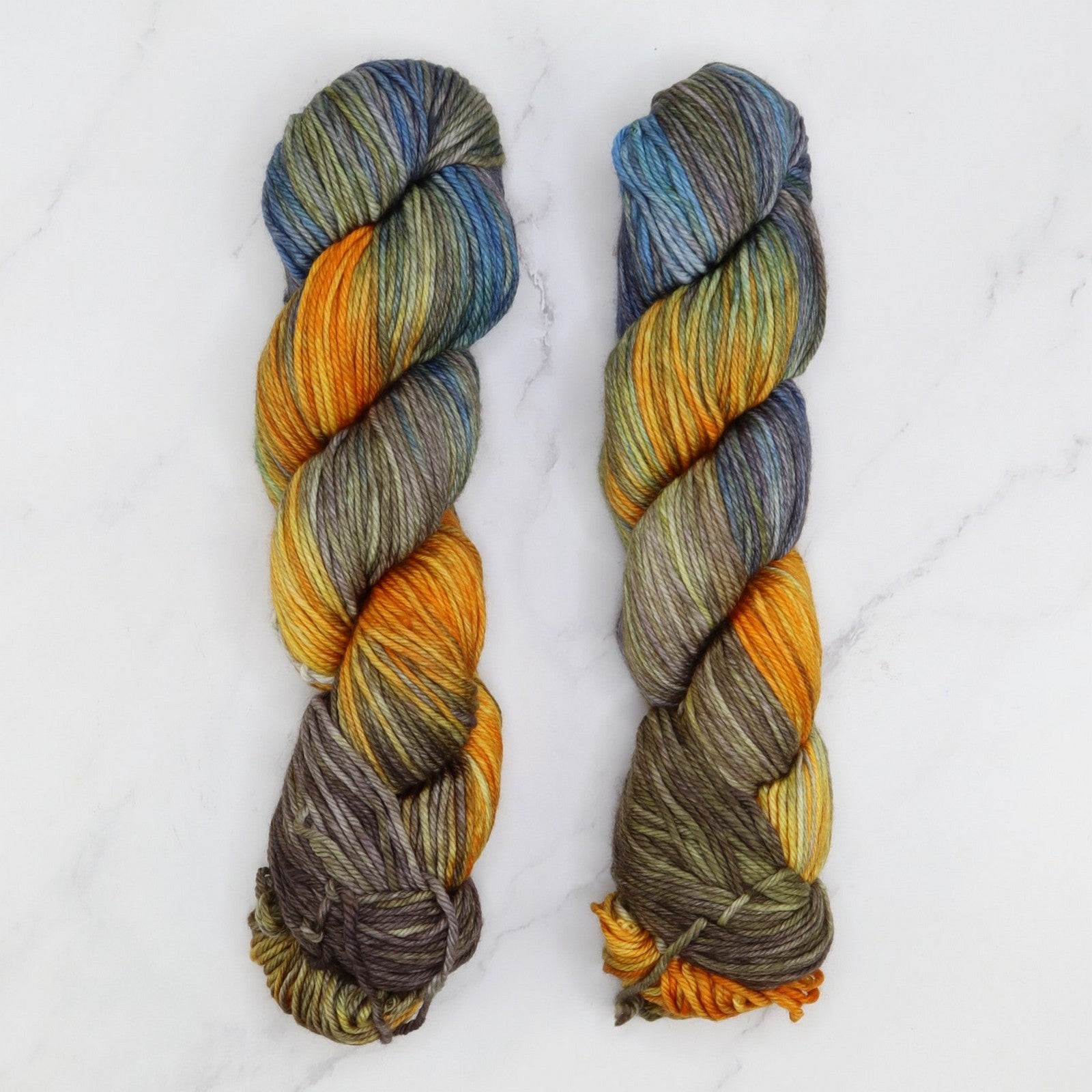 Fiori DK IV in colourway Winter Sunrise – 8ply weight merino yarn