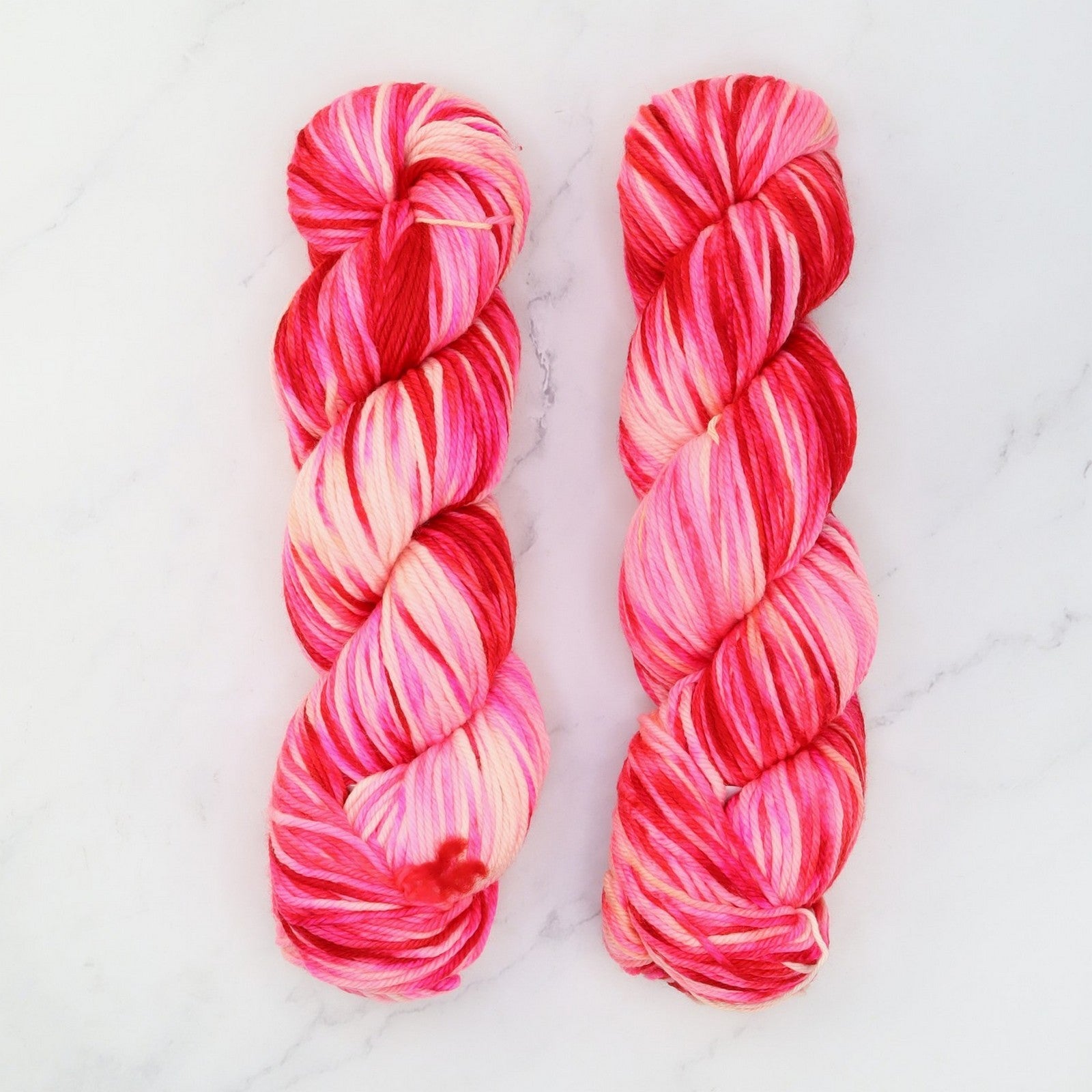 Fiori DK IV in colourway Hot Pink Confetti – 8ply weight merino yarn