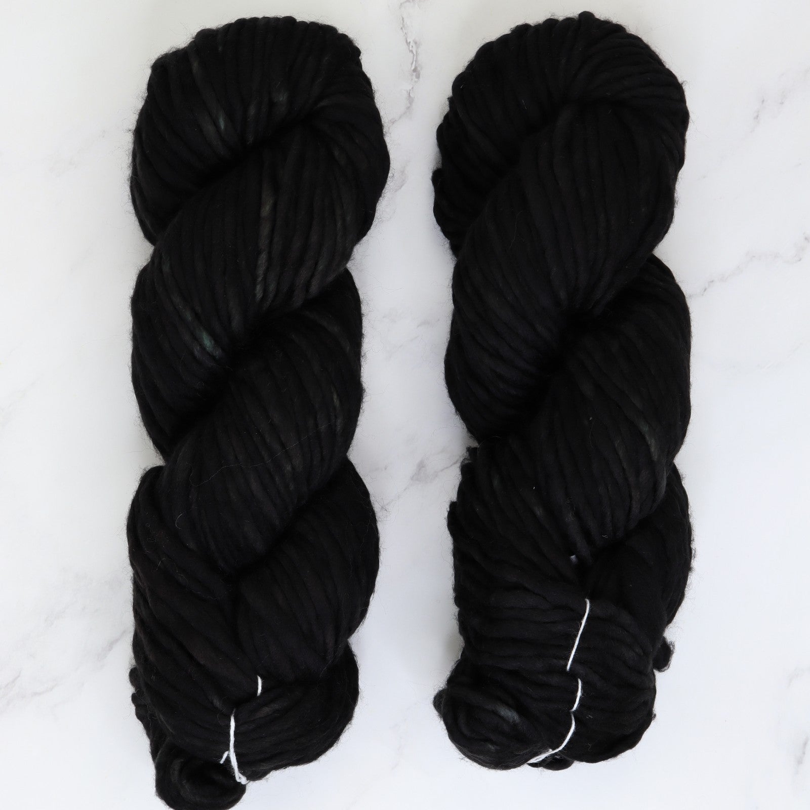 Fiori Grande in colourway Nero – 14ply+ weight merino yarn
