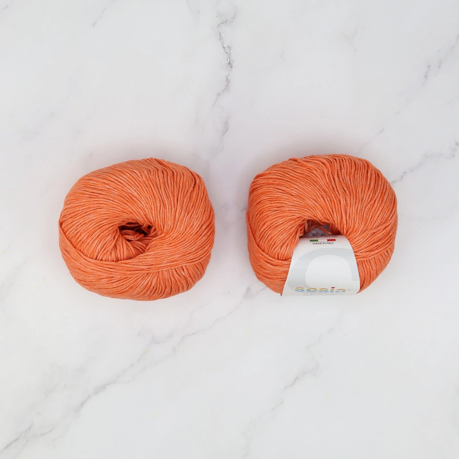 Sesia Jeans in colourway Tangerine – 4ply weight cotton yarn
