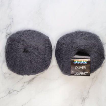 Sesia Oliver in colourway Dusky Purple – 2ply weight alpaca, nylon yarn