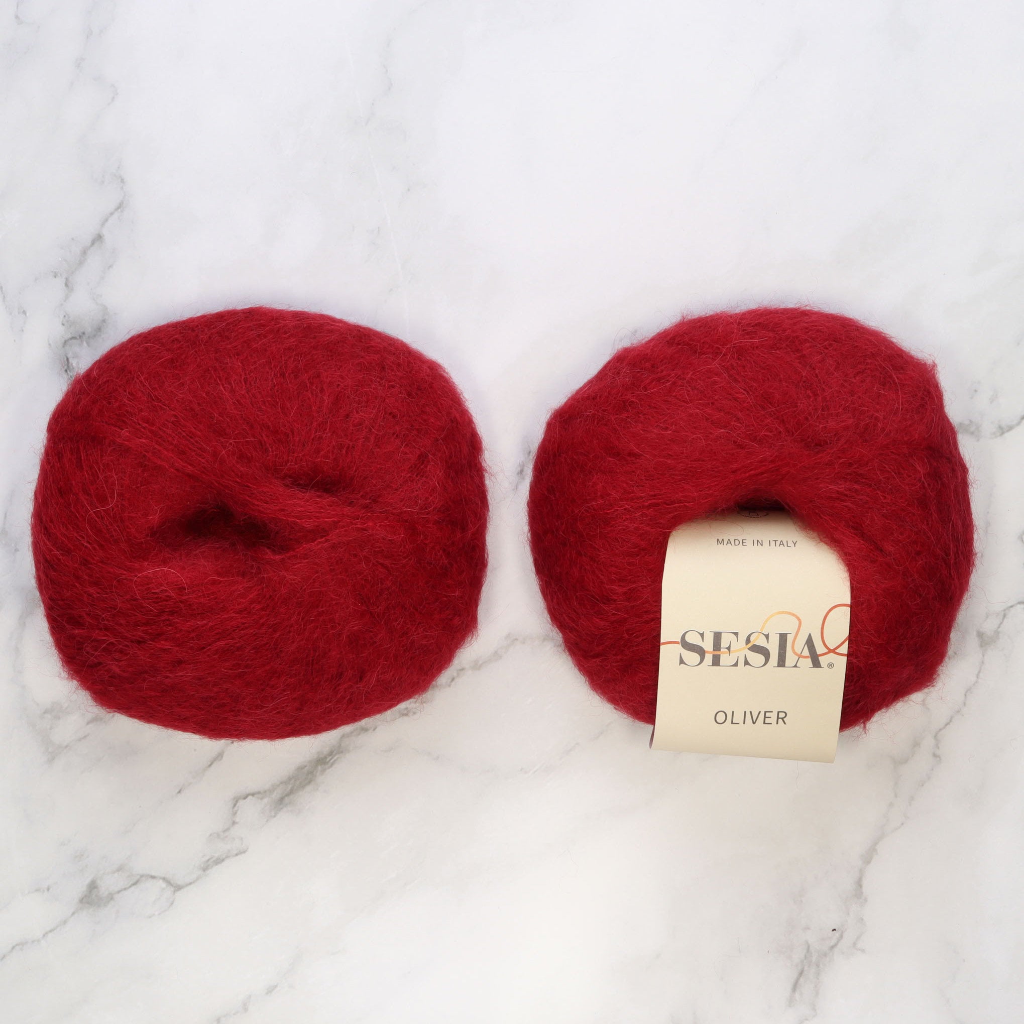 Sesia Oliver in colourway Dark Red – 2ply weight alpaca, nylon yarn