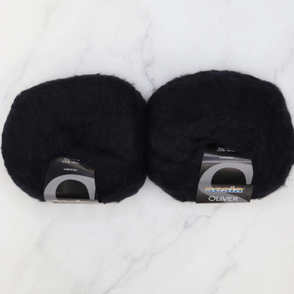 Sesia Oliver in colourway Black – 2ply weight alpaca, nylon yarn