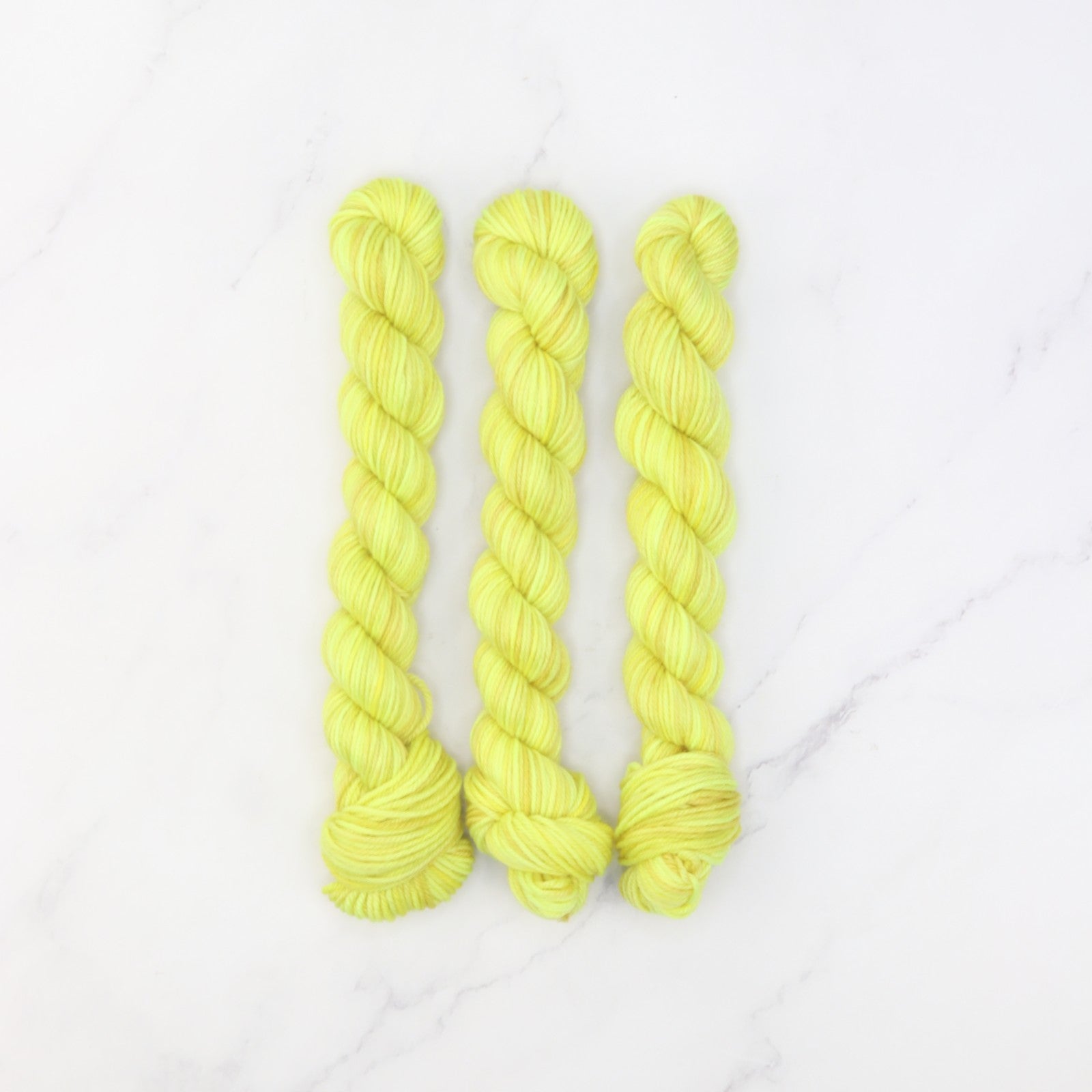 Skein Sisters Fabulous Sock Minis 20g/80m in colourway Acid Yellow – 4ply weight merino, nylon yarn