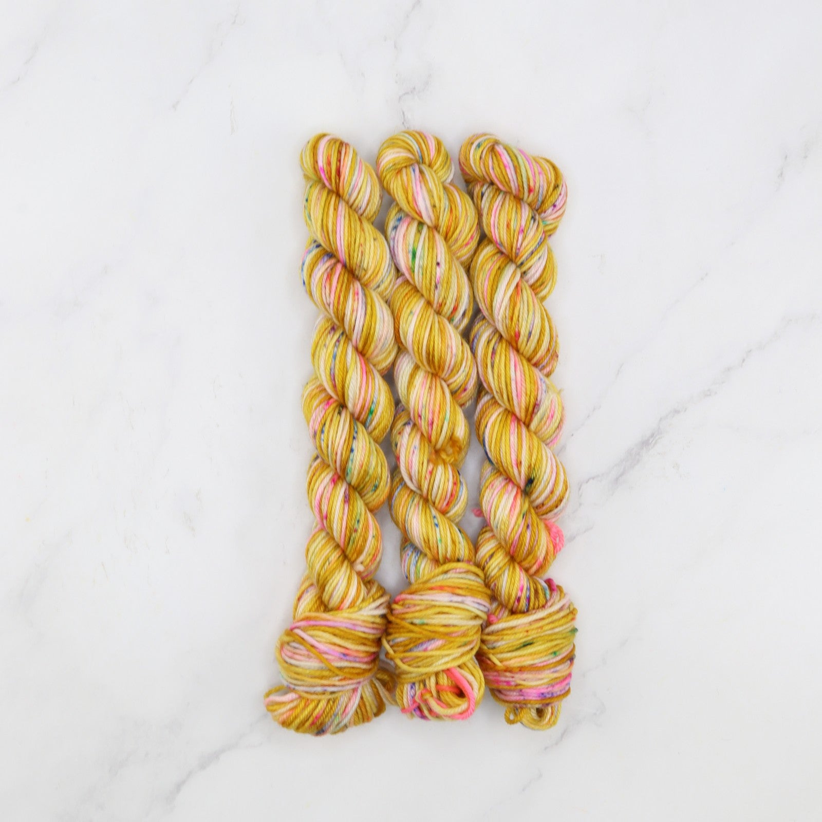 Skein Sisters Fabulous Sock Minis 20g/80m in colourway Butterscotch Sprinkles – 4ply weight merino, nylon yarn