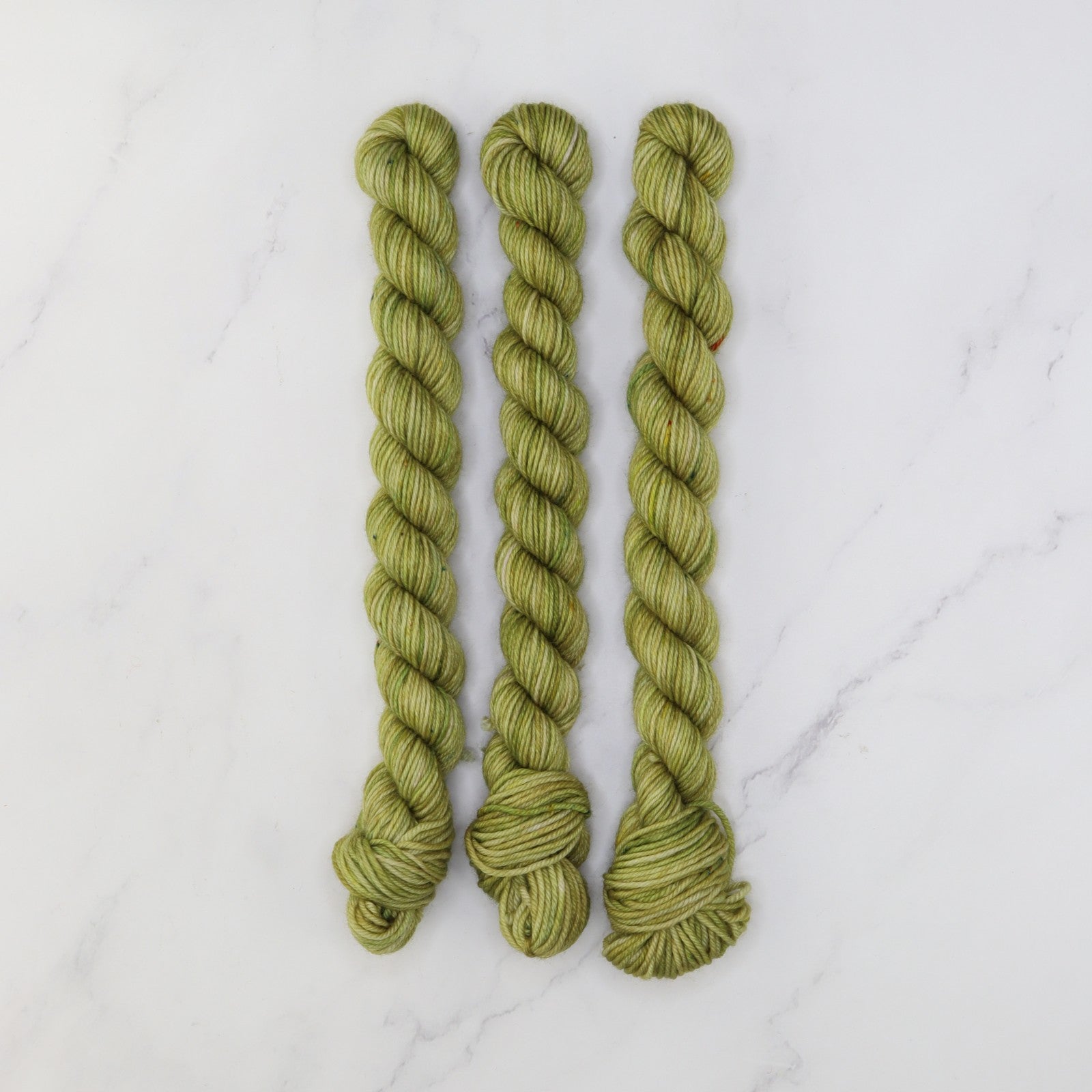 Skein Sisters Fabulous Sock Minis 20g/80m in colourway New Olive – 4ply weight merino, nylon yarn