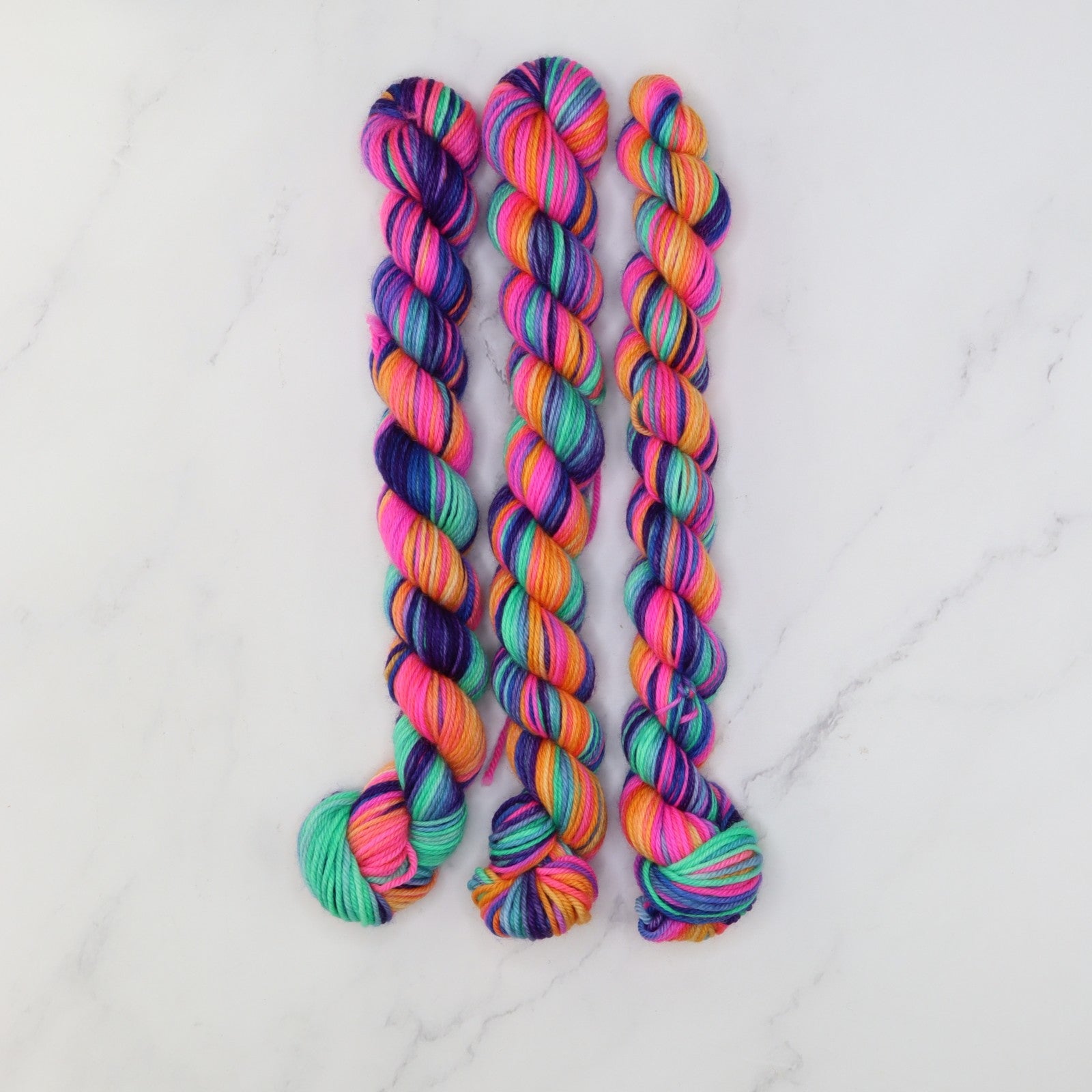 Skein Sisters Fabulous Sock Minis 20g/80m in colourway Rainbow Sparkle – 4ply weight merino, nylon yarn