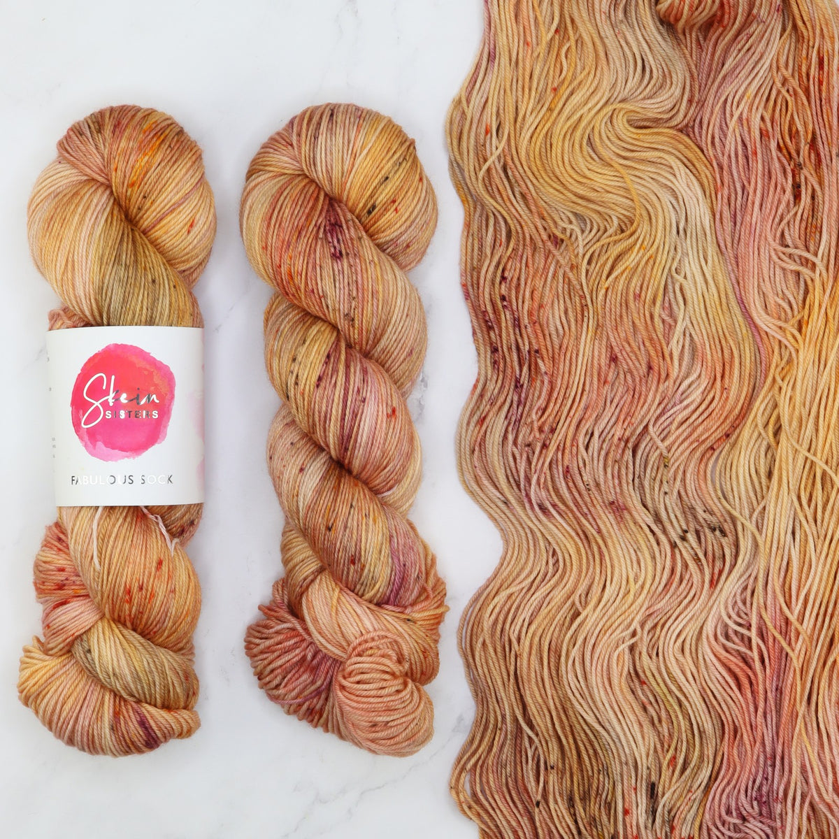 Skein Sisters Fabulous Sock in Peachy Keen, the yarn for the Outline Tee Kit