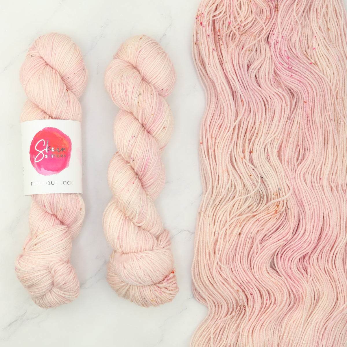 Skein Sisters Fabulous Sock in Sweet Peach, the yarn for the Outline Tee Kit