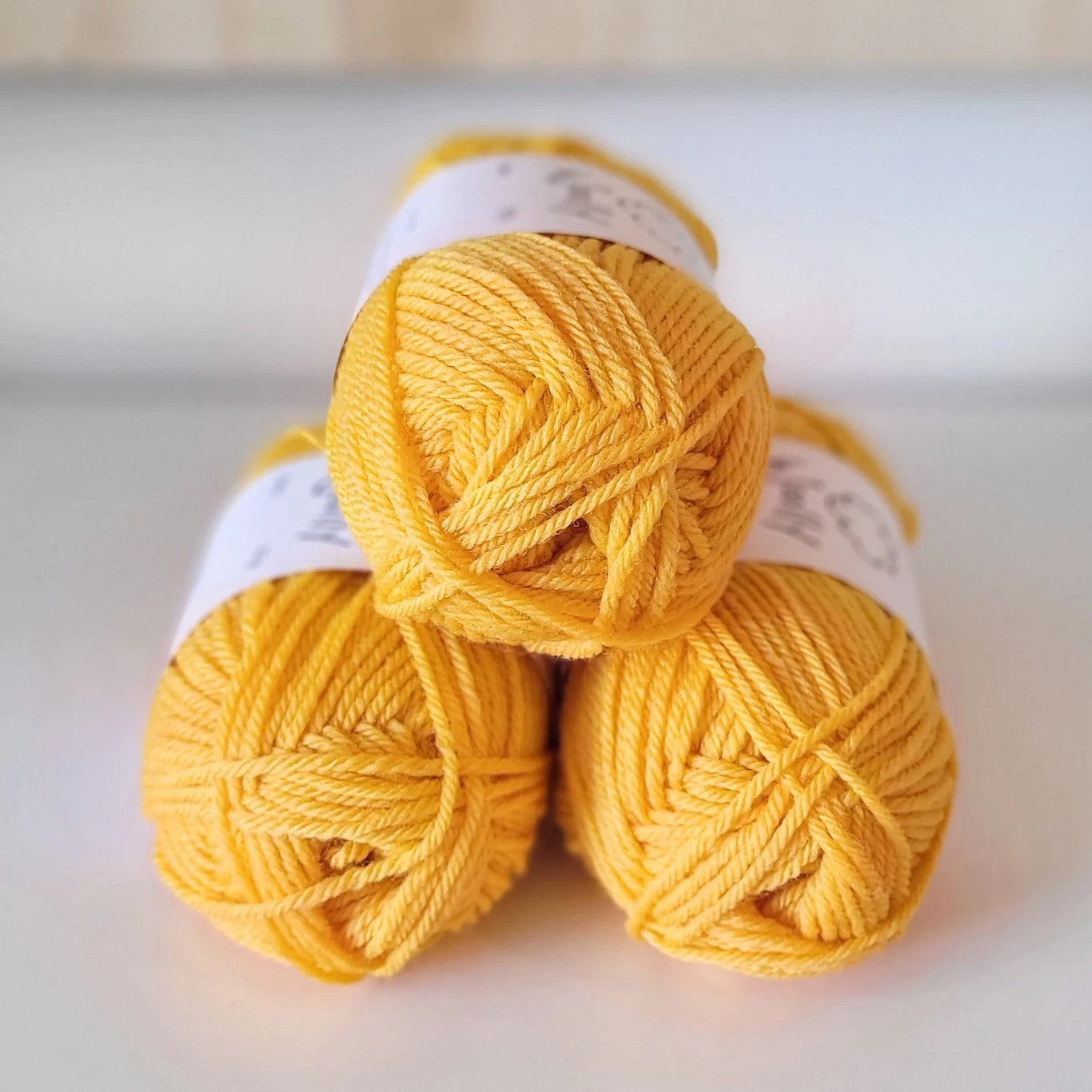Woolly Yarns Woolly 8ply in colourway Buttercup – 8ply weight wool yarn