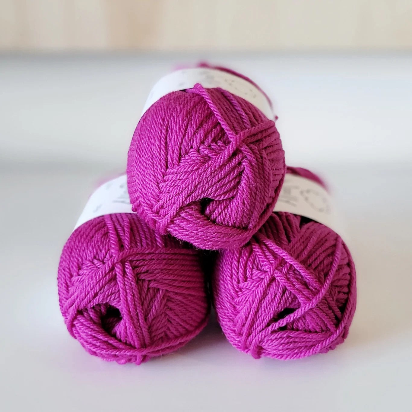Woolly Yarns Woolly 8ply in colourway Magenta Pop – 8ply weight wool yarn